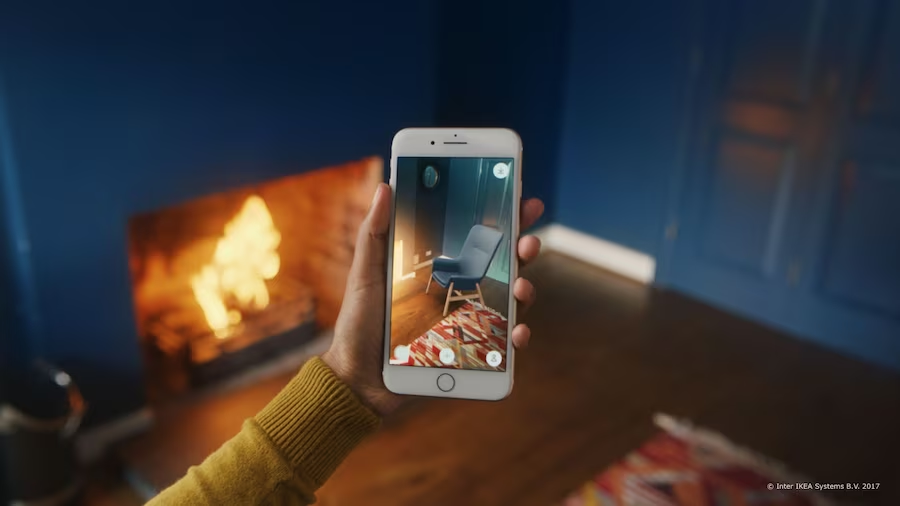 Virtual furniture app in cosy blue room.